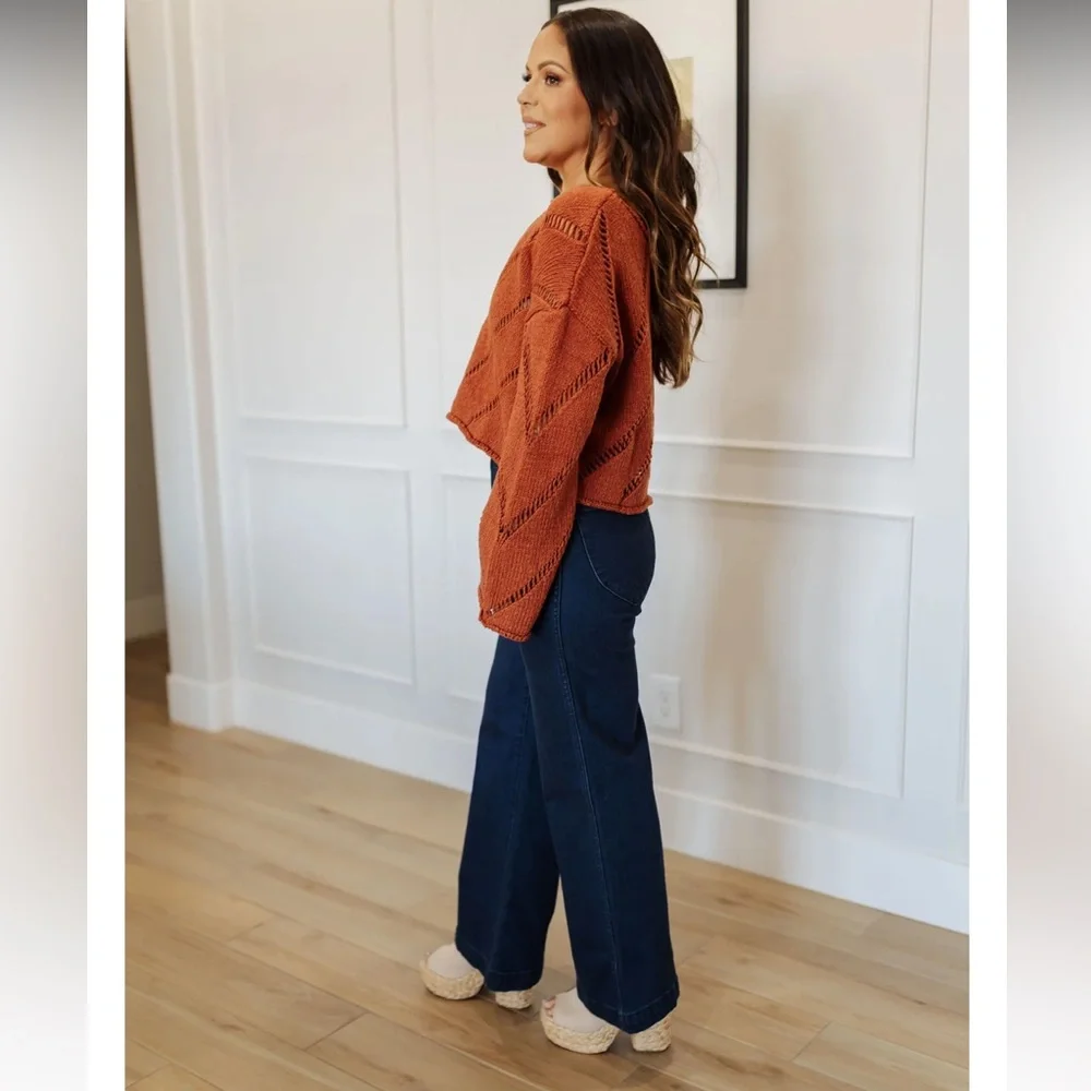 The orange Autumn Glaze Distressed‎ Sweater is Sz Medium